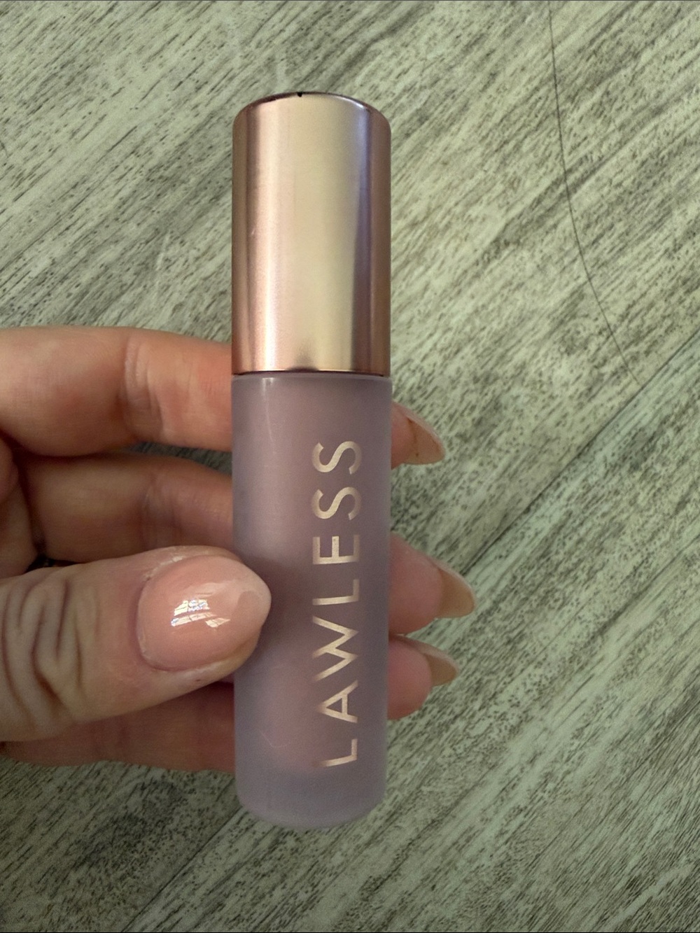 LAWLESS Lip Serum in blushed sand Frost Bottle with Rose Gold Cap